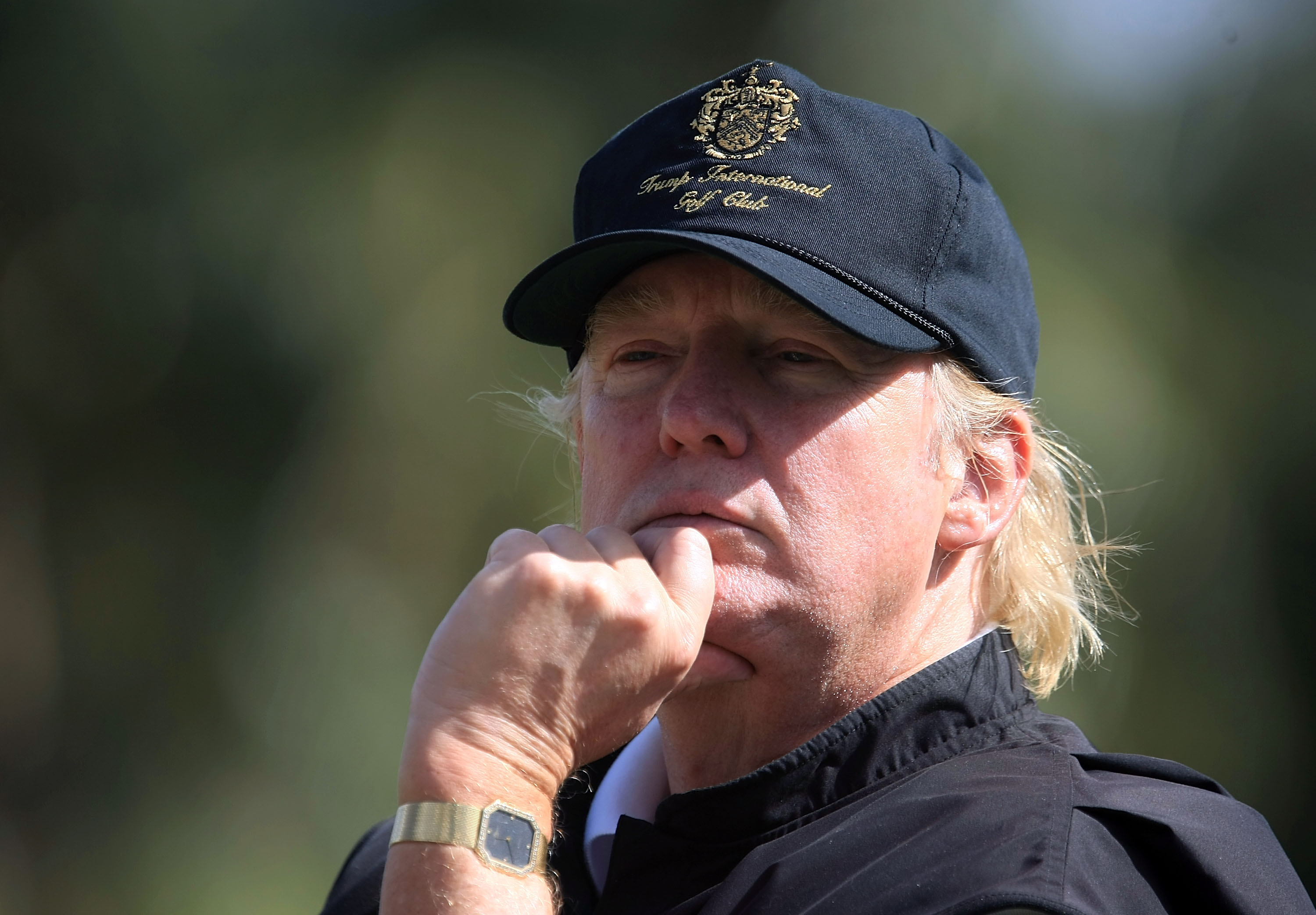 WEST PALM BEACH, FL - NOVEMBER 22:  Tournament host Donald Trump watches the play during the third round of the ADT Championship at the Trump International Golf Club on November 22, 2008 in West Palm Beach, Florida.  (Photo by Scott Halleran/Getty Images)