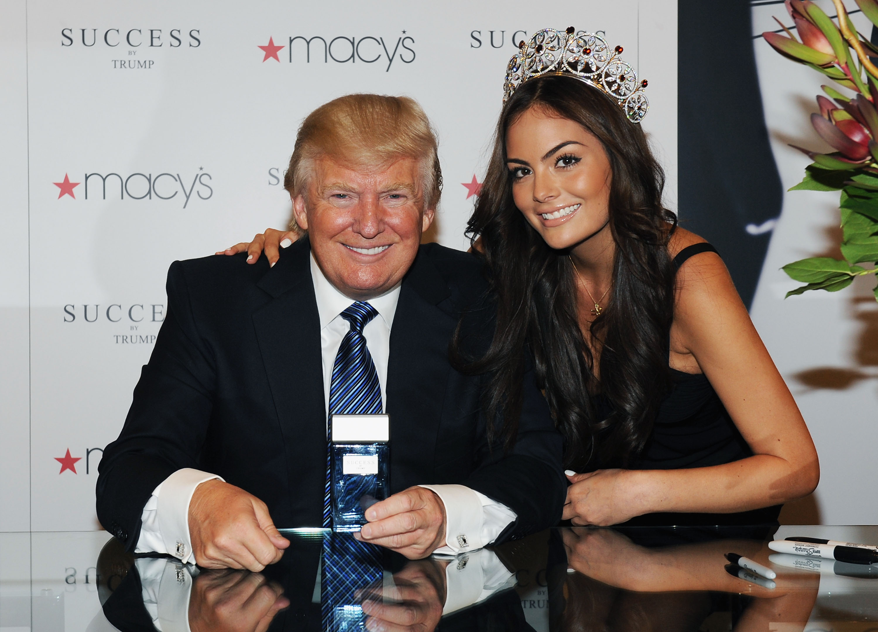 NEW YORK, NY - APRIL 18:  Business mogul/TV personality Donald Trump and Miss Universe 2010 Ximena Navarrete (R) attend the Success by Trump fragrance launch at Macy's Herald Square on April 18, 2012 in New York City.  (Photo by Slaven Vlasic/Getty Images)