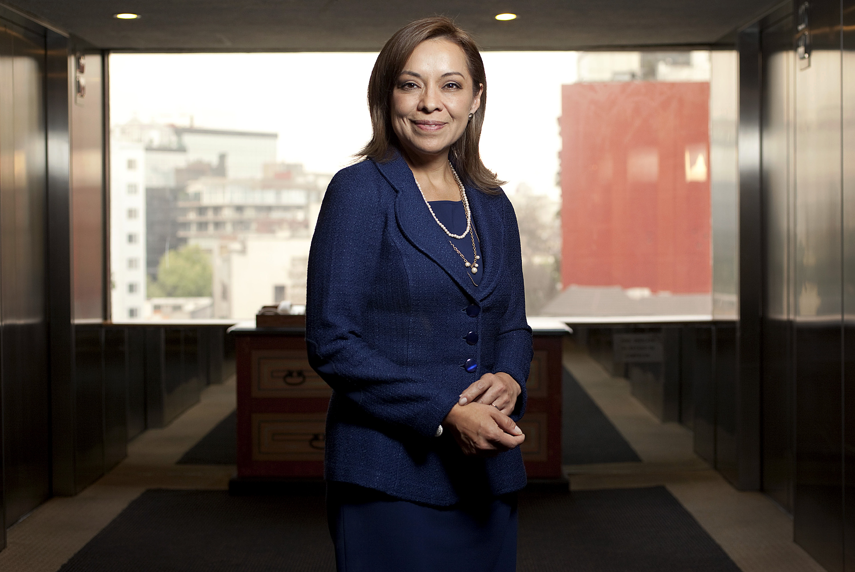 Josefina Vazquez Mota, presidential candidate for the National Action Party (PAN), stands for a photograph after an interview in Mexico City, Mexico, on Thursday, Dec. 29, 2011. Vazquez Mota said she'll aim to boost economic growth to an annual rate of at least 6 percent or 7 percent if elected in next July's vote. Photographer: Gustavo Graf/Bloomberg *** Local Caption *** Josefina Vazquez Mota